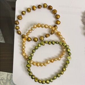 Set of Three Pearl Bracelets in Brown, Gold, and Green